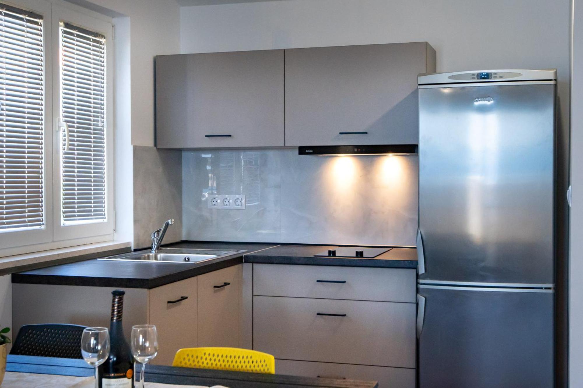 Apartments & Rooms Fam Ribaric Banjol エクステリア 写真